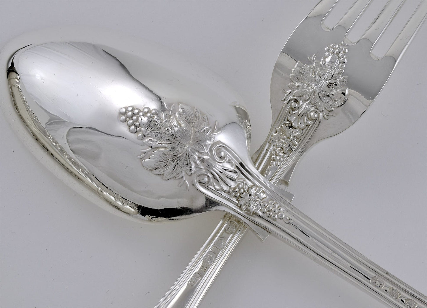 Incredibly Rare and Extensive Antique Silver Vine Pattern Service for Twenty Four. Made by George Adams in London, 1856.