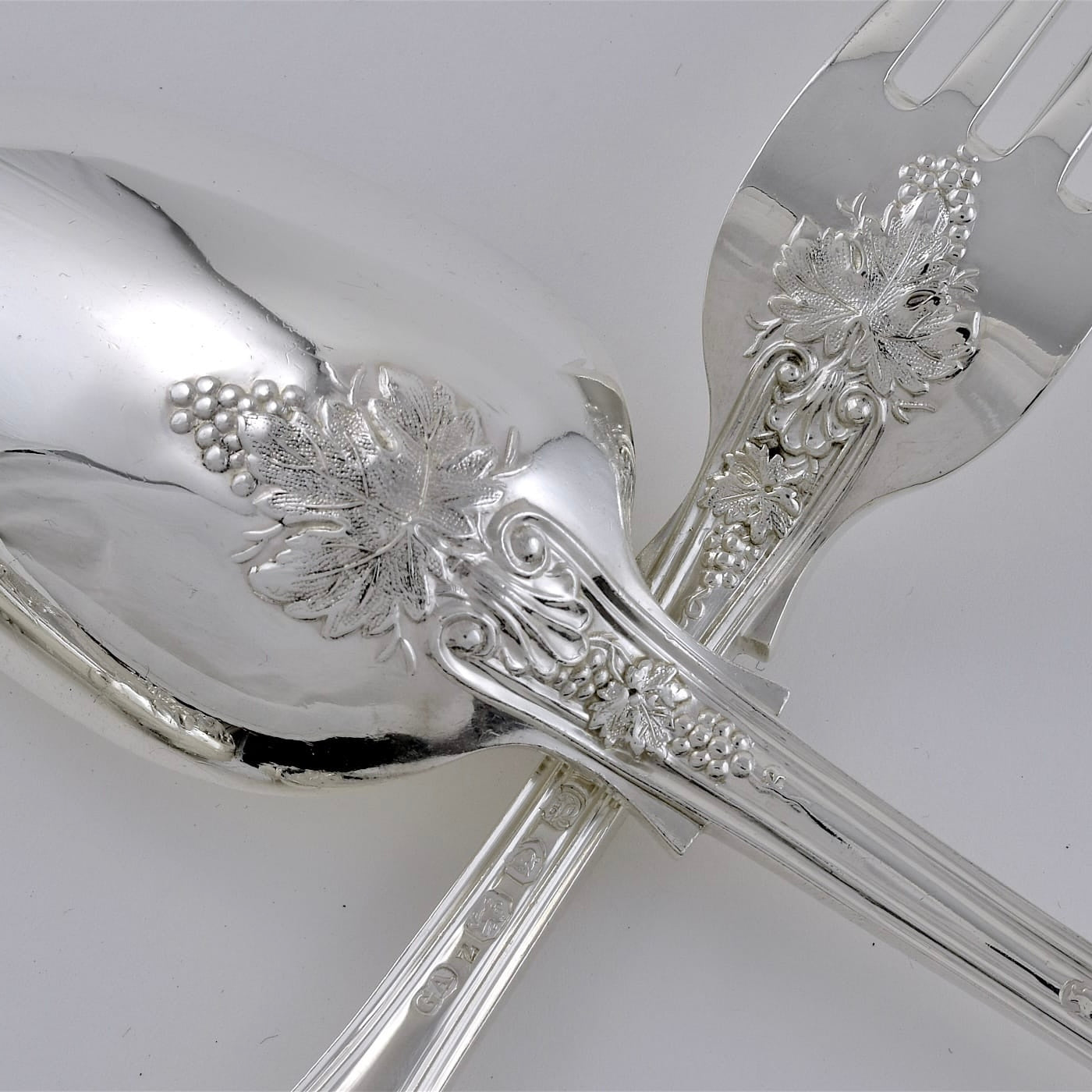 Rare and Extensive Antique Silver Vine Pattern Service for Twenty Four. Made by George Adams, London 1855